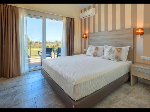 Кровать или кровати в номере Villas Marajo