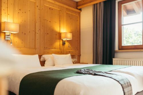 Cama o camas de una habitación en Hotel Kirchenwirt