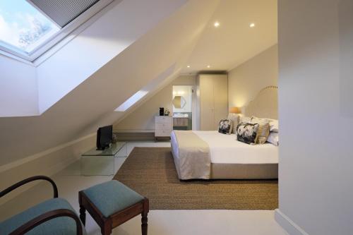 Katil atau katil-katil dalam bilik di Chapter House Boutique Hotel by The Living Journey Collection