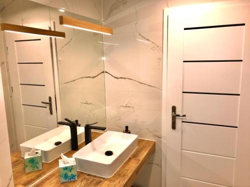 Kúpeľňa v ubytovaní Apartament „Blue Forest”