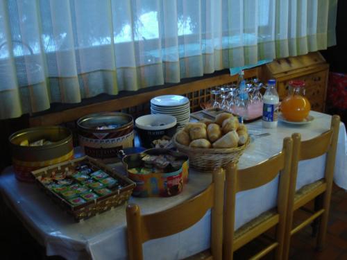 a table with a bunch of food on it at Albergo Cioccarelli in Aprica
