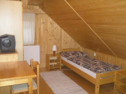 Posteľ alebo postele v izbe v ubytovaní Chalupa u Drába