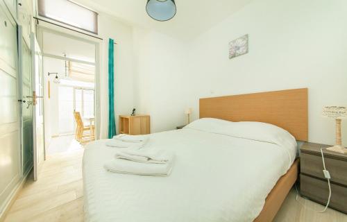 Voodi või voodid majutusasutuse A46 - Oliveira Downtown Apartment toas