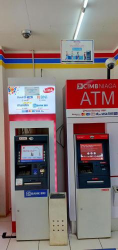 two atm machines sitting next to each other at NYENYAK MRT Lebak Bulus Simatupang in Jakarta