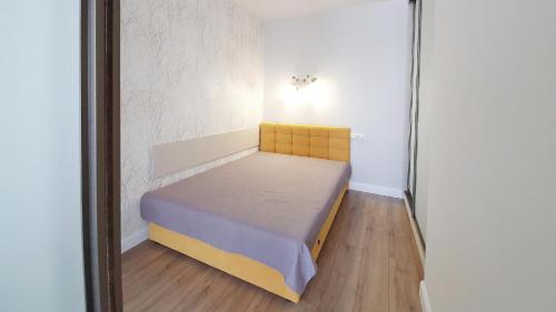 Ένα ή περισσότερα κρεβάτια σε δωμάτιο στο WONDERFUL PLACE