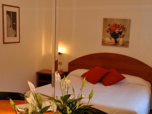 Posteľ alebo postele v izbe v ubytovaní Golf Hotel