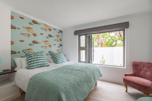 Postel nebo postele na pokoji v ubytování ocean10 Guesthouse
