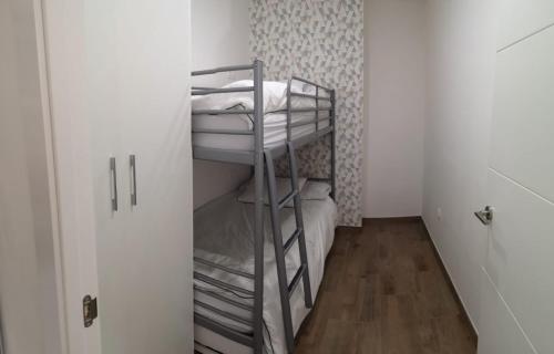 Postel nebo postele na pokoji v ubytování slalom premium