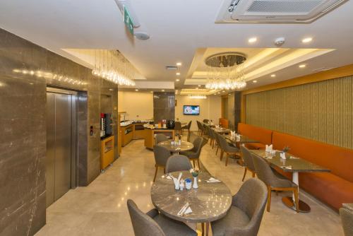 Posezení v ubytování Bisetun Hotel