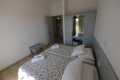 Katil atau katil-katil dalam bilik di Filippas Rooms in Gouvia