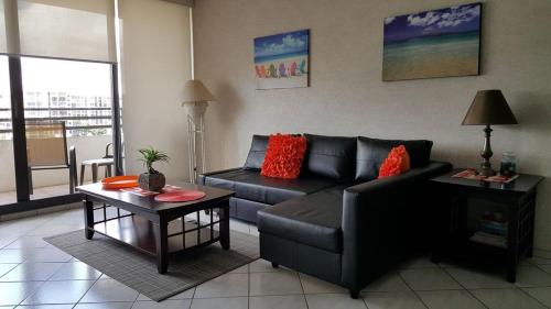 A seating area at Alexander Towers Apartment directly on the beach