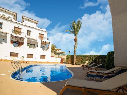 The swimming pool at or close to Apartment in Palomares near the Beach