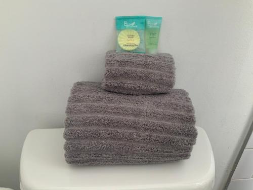 a pile of yarn sitting on top of a toilet at Hollywood Beach Apartments - Walk to the Beach in Hollywood