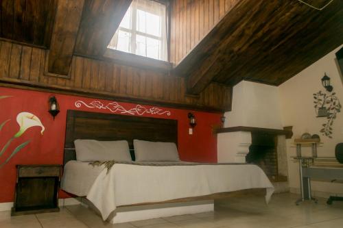 Łóżko lub łóżka w pokoju w obiekcie Terraza Suites - Adults Only