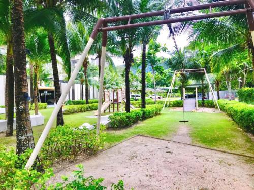 Zahrada ubytování Beachfront Resort By The Sea, Batu Ferringhi