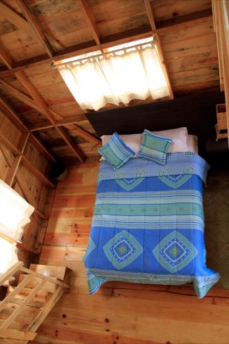 Una cama o camas en una habitación de Reserva Azul