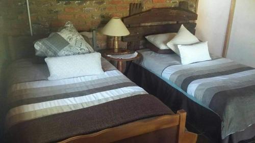 Ένα ή περισσότερα κρεβάτια σε δωμάτιο στο Waboom Farm Stay