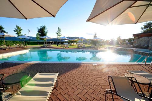 The swimming pool at or close to La Fonte Di Montebuono