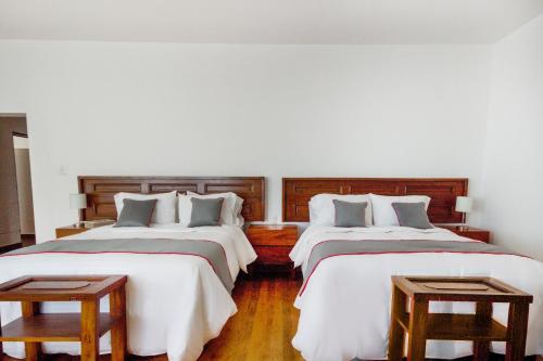 Ένα ή περισσότερα κρεβάτια σε δωμάτιο στο Azabu Hotel Collection