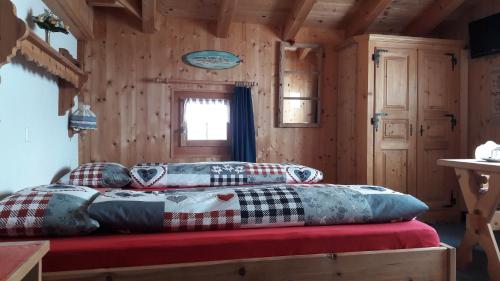 Postel nebo postele na pokoji v ubytování B&B Haus im Sand