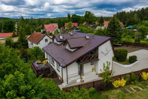 Fotografia z galérie ubytovania Karmuszka Family House z jacuzzie, sauną i siłownią na wyłączność v destinácii Łukta