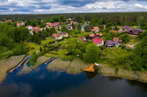 Fotografia z galérie ubytovania Karmuszka Family House z jacuzzie, sauną i siłownią na wyłączność v destinácii Łukta