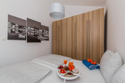 Säng eller sängar i ett rum på OLEA Resort