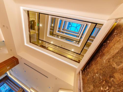 an overhead view of a room with a window at Hotel New Star in Podgorica