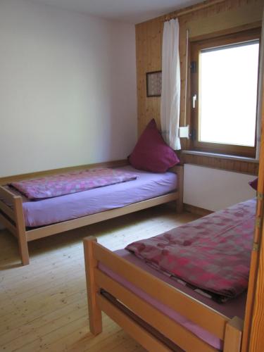 A bed or beds in a room at Ferienhaus Edersee