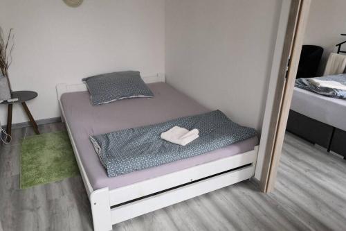 Postel nebo postele na pokoji v ubytování Apartmán 2kk Beroun