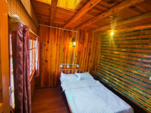 Katil atau katil-katil dalam bilik di Tiger leaping gorge tea horse gasthaus