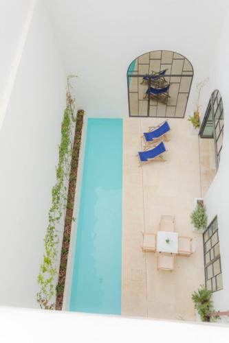 a rendering of the pool at the resort at Can Araya in Ciutadella