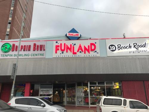 two cars parked in front of a store at 111 Lescalier Cabanas - Amanzimtoti in Amanzimtoti