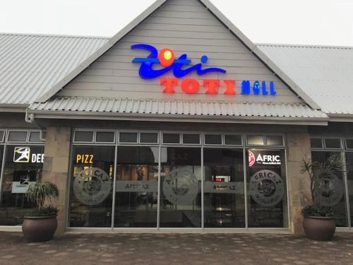 a store with a sign on the front of it at 111 Lescalier Cabanas - Amanzimtoti in Amanzimtoti