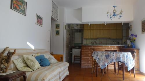 Virtuvė arba virtuvėlė apgyvendinimo įstaigoje Appartamento Regina nel Verde