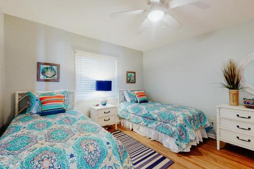 Katil atau katil-katil dalam bilik di Ocean Retreat & Villas