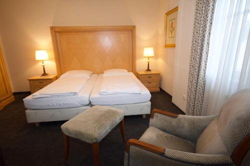 Ein Bett oder Betten in einem Zimmer der Unterkunft Gästehaus Bavaria