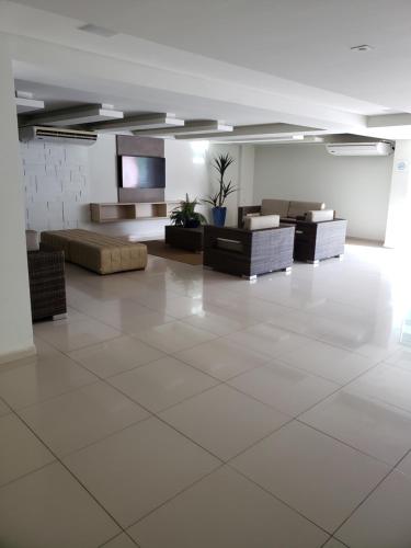 Ruang duduk di Life Tabatinga Beach-Flat com Wi-Fi