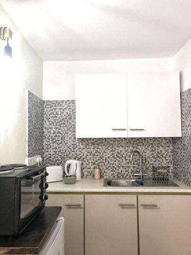 Kuchyň nebo kuchyňský kout v ubytování Katsikantaris Homes