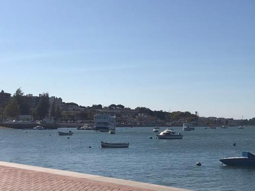 a large body of water with boats in it at O Pátio in Fernao Ferro