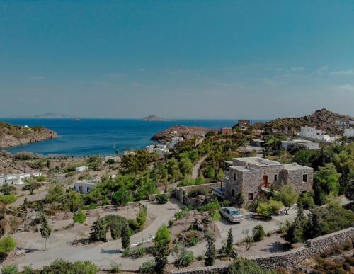 an aerial view of a town with the ocean at Blue Vista Patmos in Skala