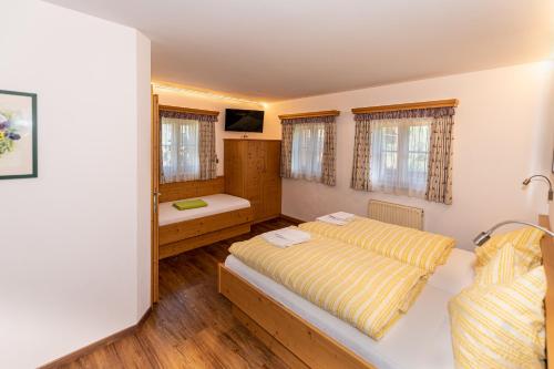 Postel nebo postele na pokoji v ubytování Appartement Unterhof