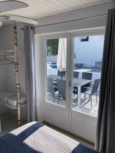 เตียงในห้องที่ Villa Blanche