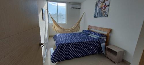 Tempat tidur dalam kamar di New Apartment Reserva del Mar 1421 Santa Marta ocean view