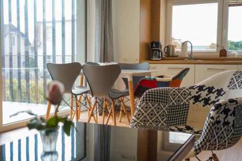 Posezení v ubytování Vila Věkoše - apartmán s terasou a zahradou