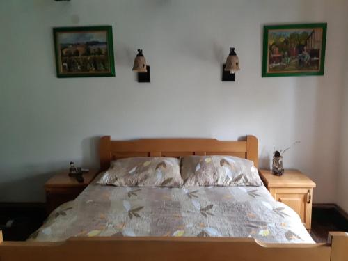 Postel nebo postele na pokoji v ubytování Ilkićev kućerak Apartman