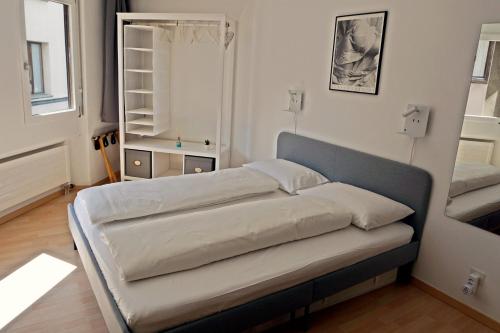 Кровать или кровати в номере Helles & schickes Studio für 2 Pers, zentral - C5