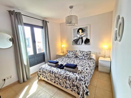 Postel nebo postele na pokoji v ubytování Villa Zinnia