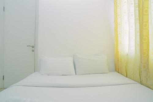 Comfy and Furnished 2BR Bassura City Apartment near Mall By Travelio