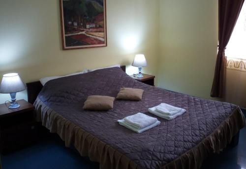 Cama o camas de una habitación en Smeštaj Franica